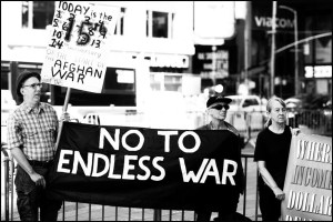 signs and banners against endless war