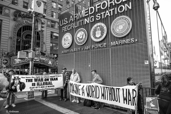 banners at recruiting center disobey orders; world without war